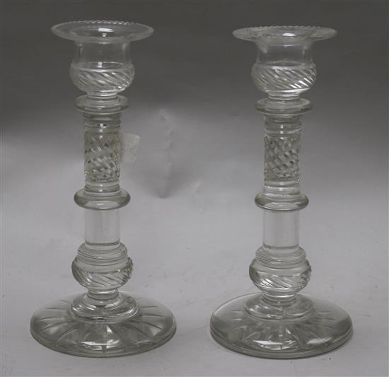 A pair of cut glass candlesticks 25cm.